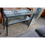 A MODERN BLACK METAL FRAME 2 TIER SIDE-TABLE WITH INSET GLASS TOP AND SHELF, 42" WIDE