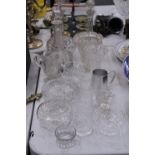 A QUANTITY OF GLASSWARE TO INCLUDE DECANTERS, VASES, JUGS, BOWLS, ETC
