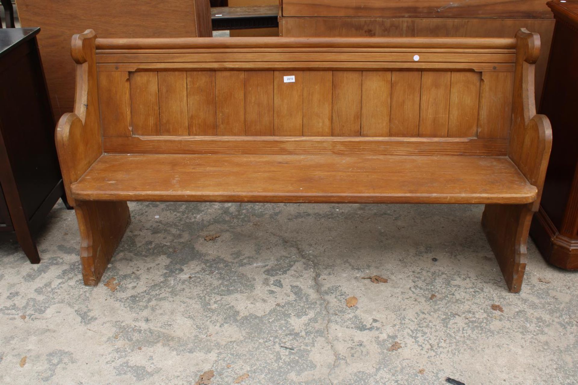 A VICTORIAN PITCH PINE PEW, 61" WIDE