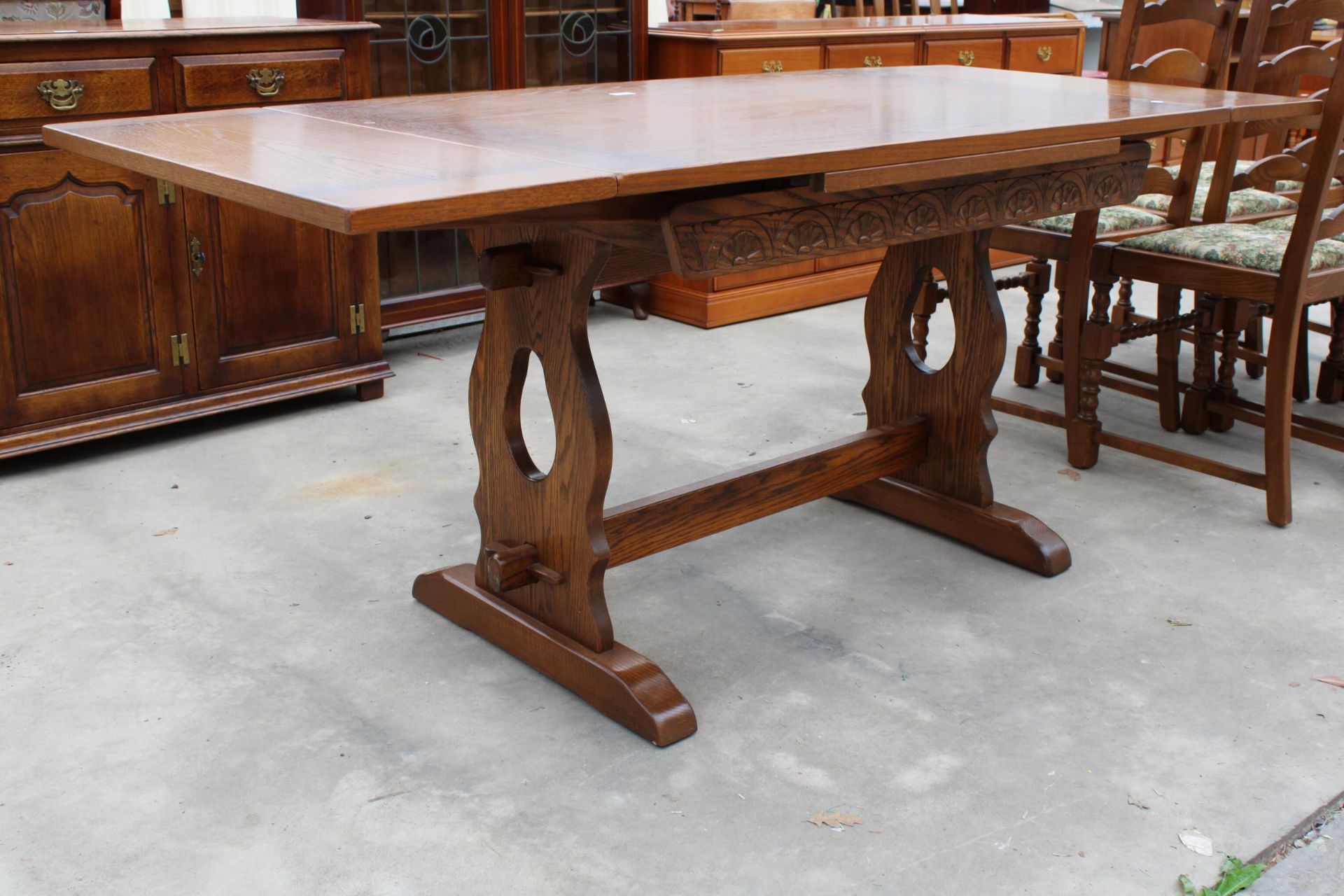 AN OAK JAYCEE REFECTORY STYLE DRAW-LEAF DINING TABLE, 48 X 32 INCHES (LEAVES 12 INCHES EACH) - Image 2 of 4