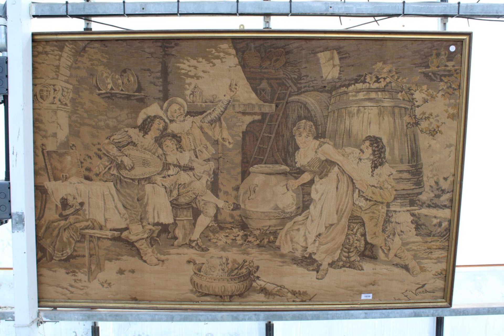 A VINTAGE FRAMED TAPESTRY