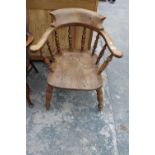 A VICTORIAN STYLE ELM AND BEECH CAPTAINS CHAIR WITH TURNED LEGS AND UPRIGHTS