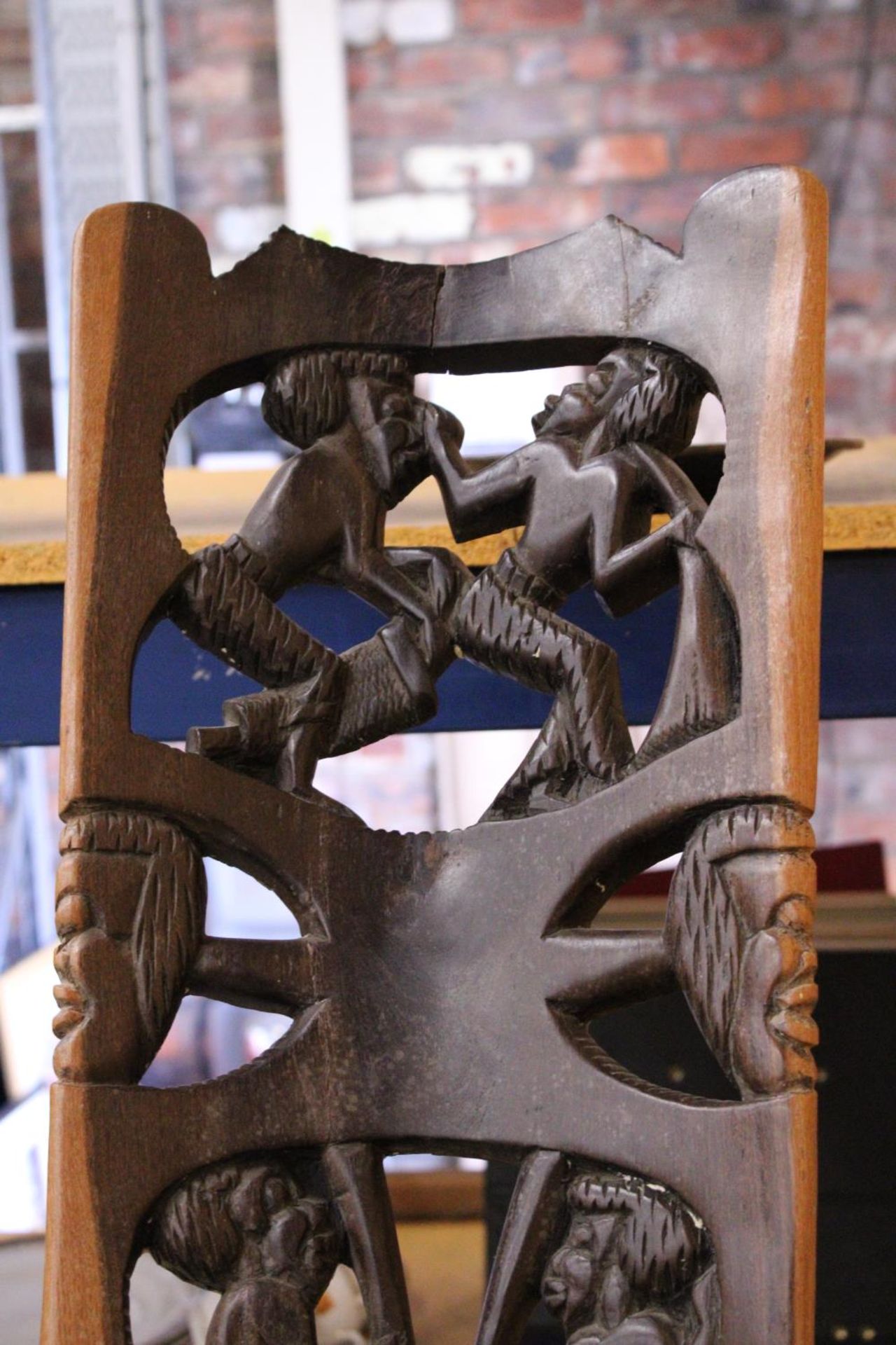 A VERY HEAVY CARVED AFRICAN BIRTHING CHAIR -APPROXIMATELY 91M - Image 3 of 4