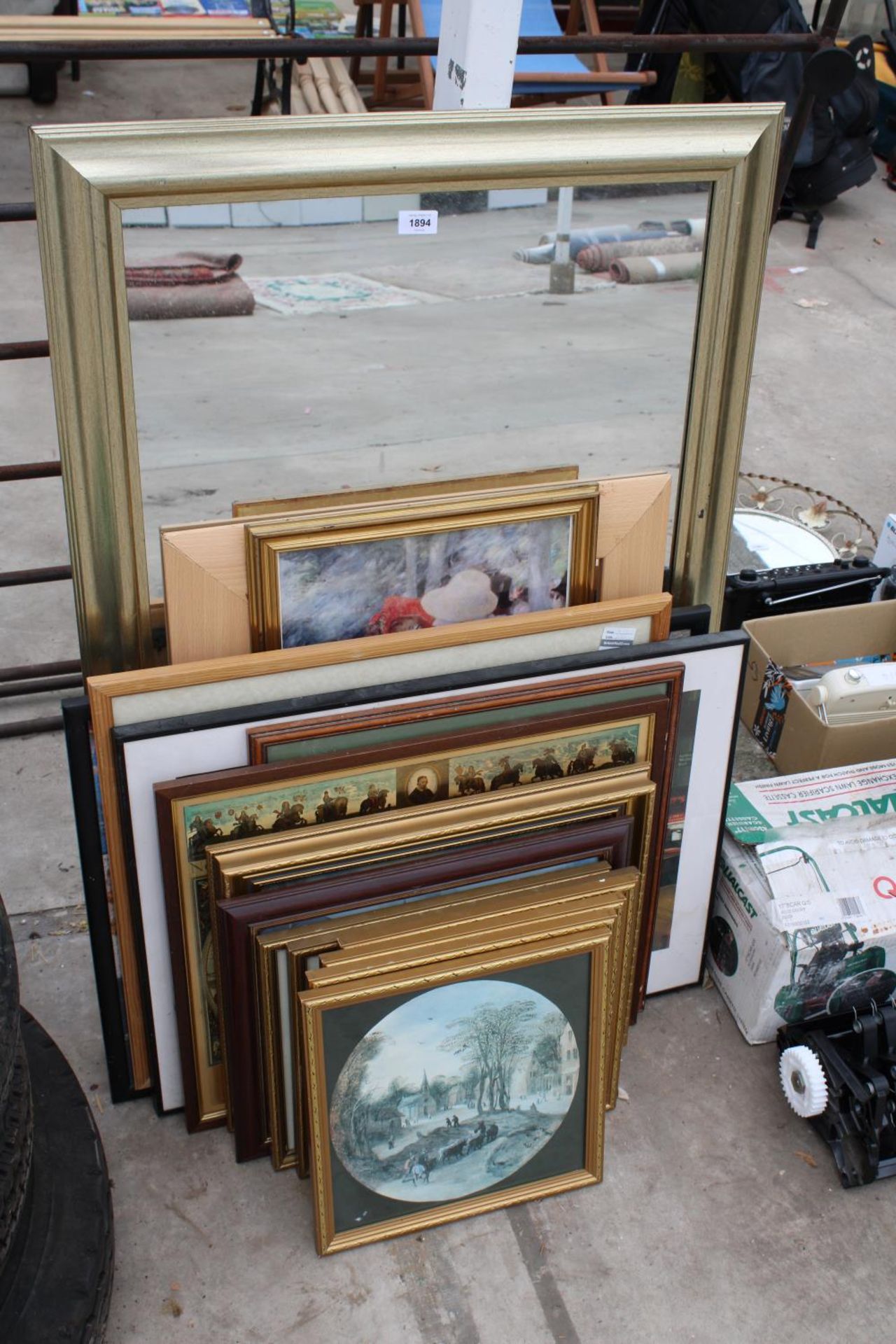 AN ASSORTMENT OF FRAMED PRINTS AND A MIRROR