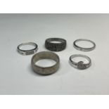 FIVE SILVER RINGS