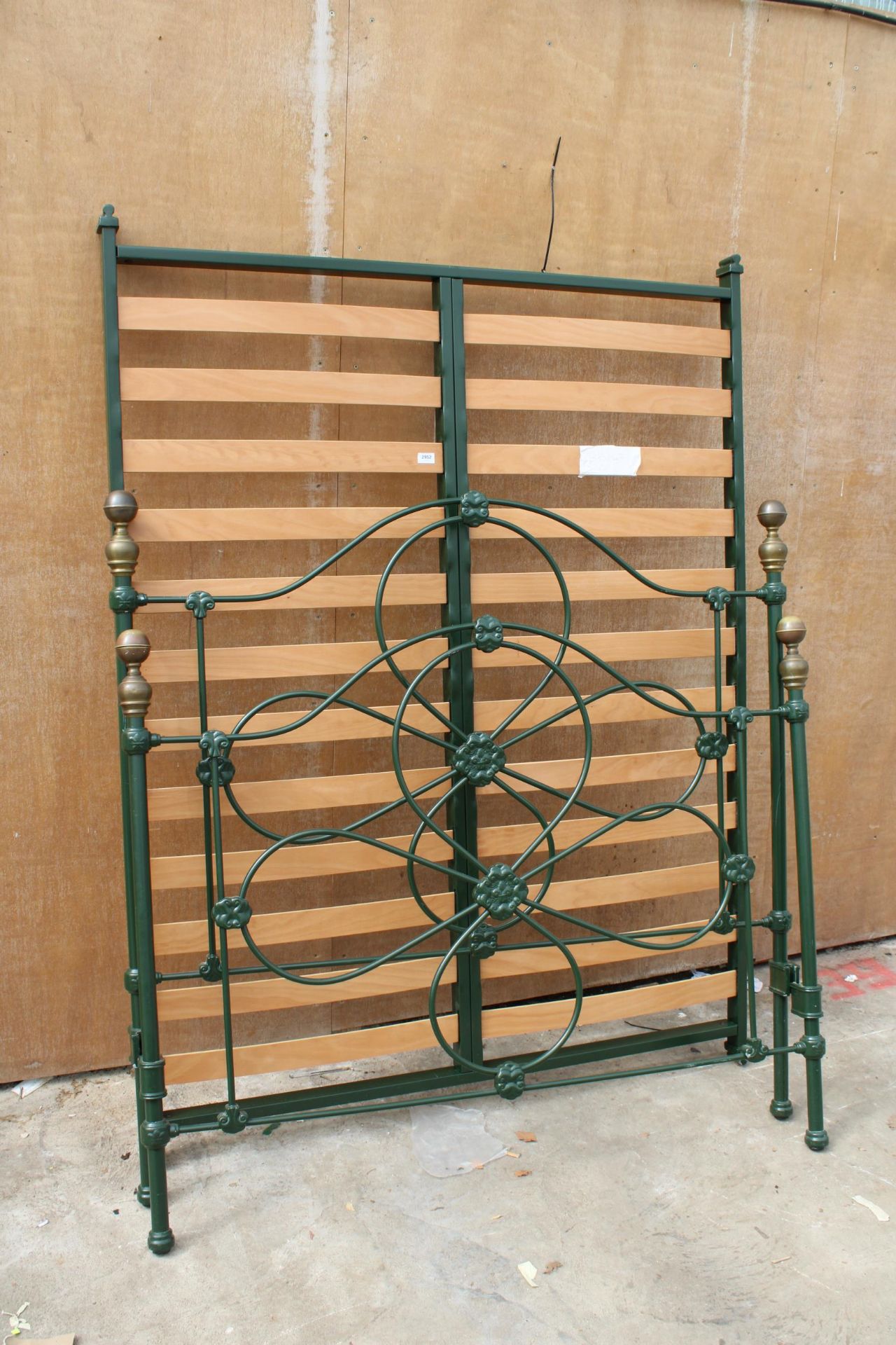 A VICTORIAN STYLE BRASS AND IRON 4' 6" BEDSTEAD