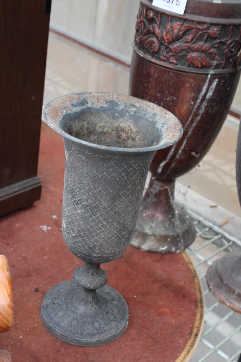 A PAIR OF ORNATE AND DECORATIVE COPPER URNS AND A A FURTHER SILVER PLATED URN - Image 3 of 3