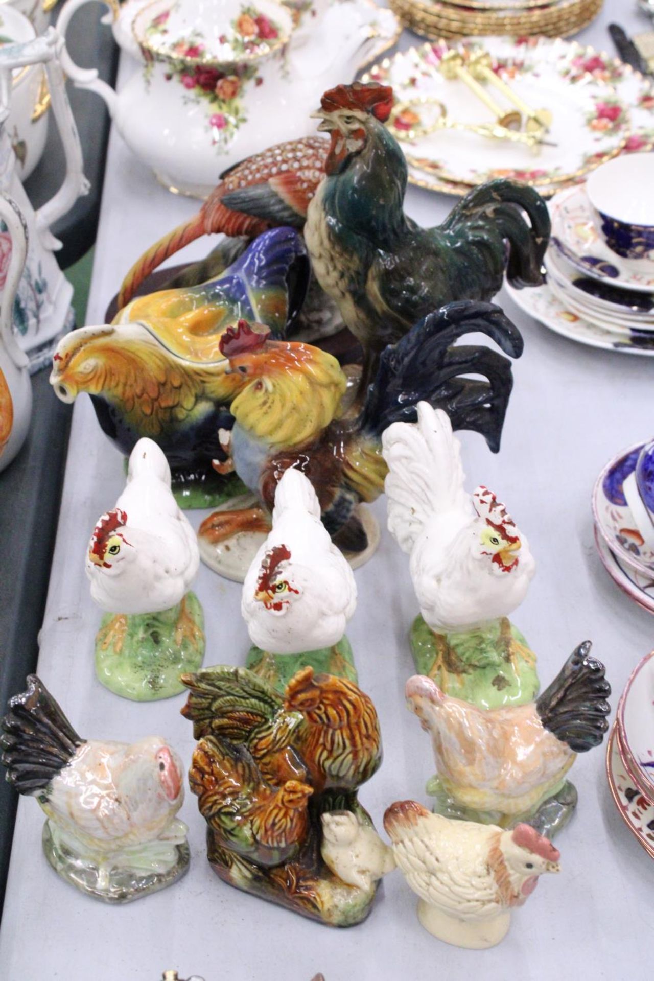 A MIXED LOT OF CHICKEN ORMAMENTS TO INCLUDE A TEAPOT AND A PHEASANT ON WOODEN PLINTH