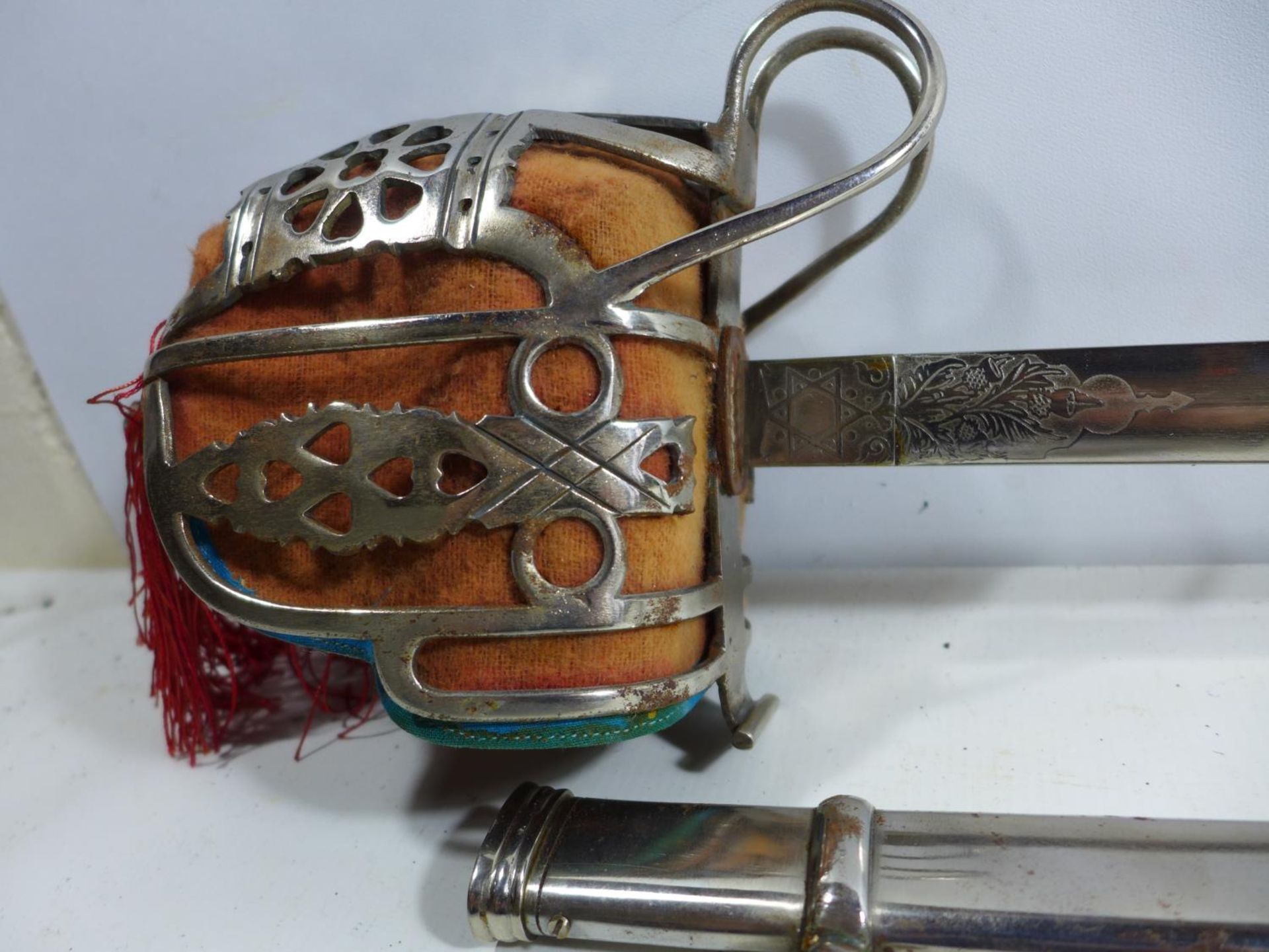 A REPLICA OF A VICTORIAN 1857 PATTERN SCOTTISH BASKET HILTED SWORD AND SCABBARD, 79CM BLADE, - Image 2 of 9