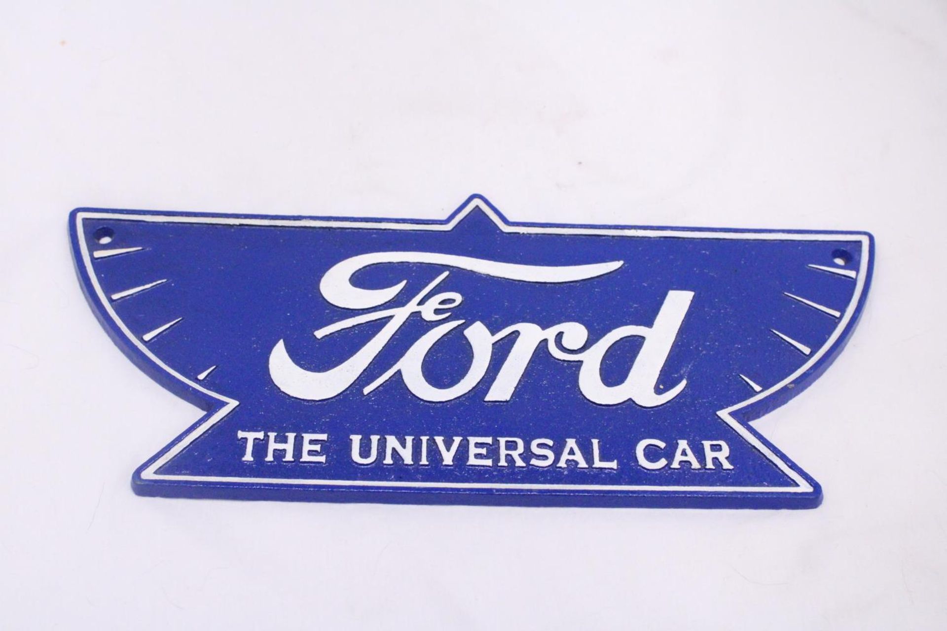 A CAST FORD THE UNIVERSAL CAR SIGN