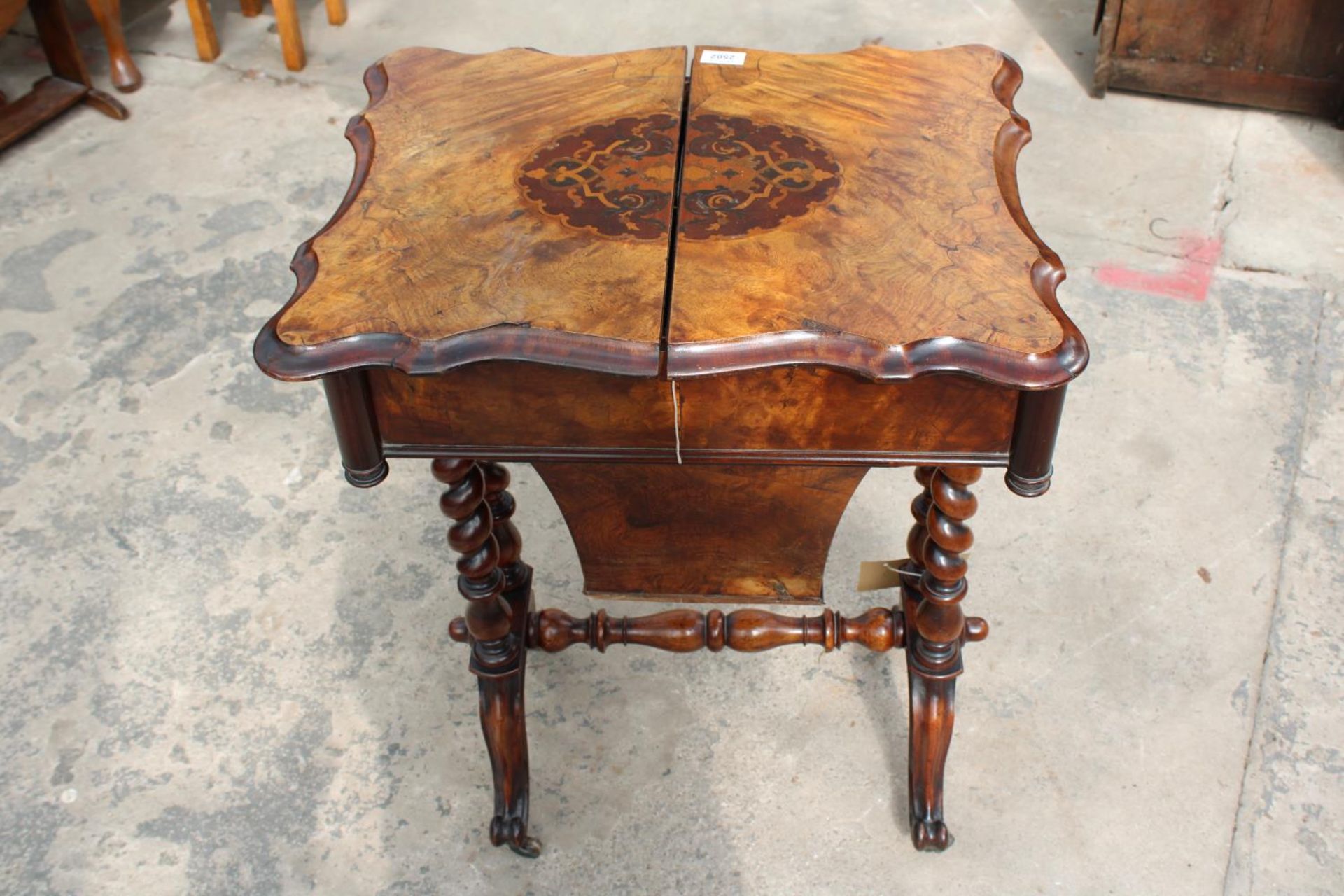 A VICTORIAN WALNUT SEWING TABLE WITH SLIDING TOP ENCLOSING 8 LIDDED COMPARTMENTS, ON BARLEY-TWIST - Image 4 of 10