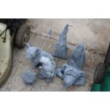 FIVE CONCRETE GARDEN FIGURES TO INCLUDE PEPPA PIG AND A FRENCH BULLDOG ETC