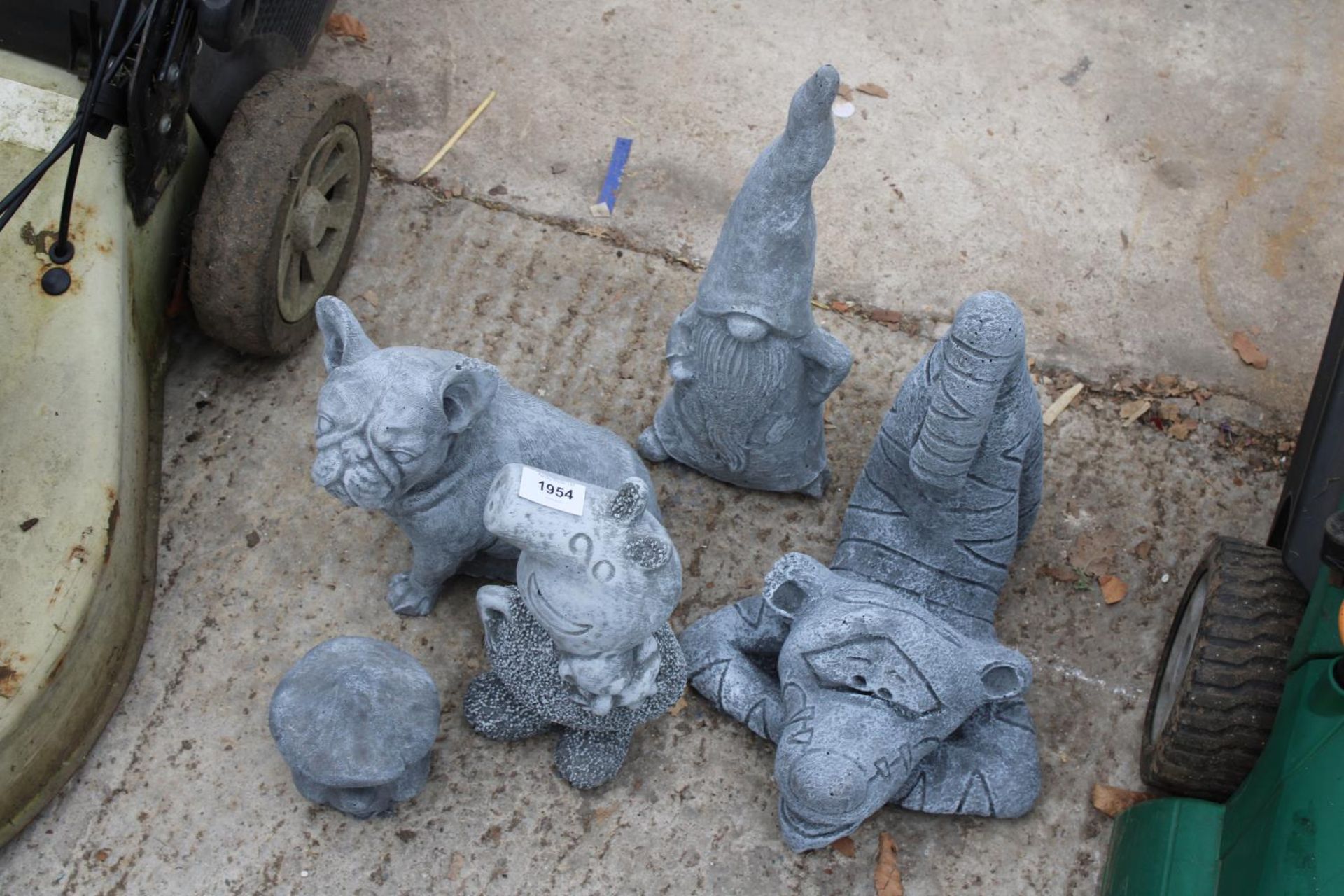 FIVE CONCRETE GARDEN FIGURES TO INCLUDE PEPPA PIG AND A FRENCH BULLDOG ETC