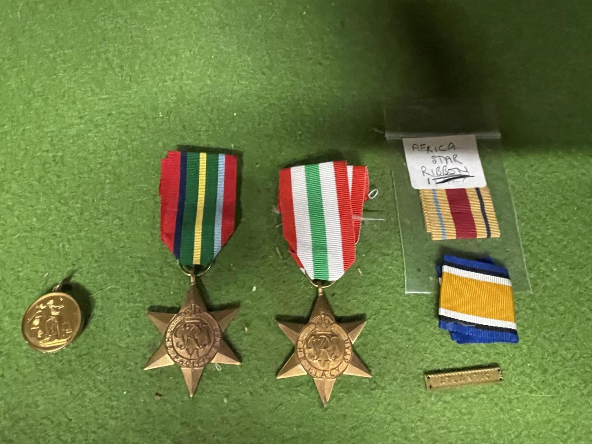 TWO UK WWII MEDALS, PACIFIC AND ITALY, PLUS AN ESCAPULATED EXAMPLE