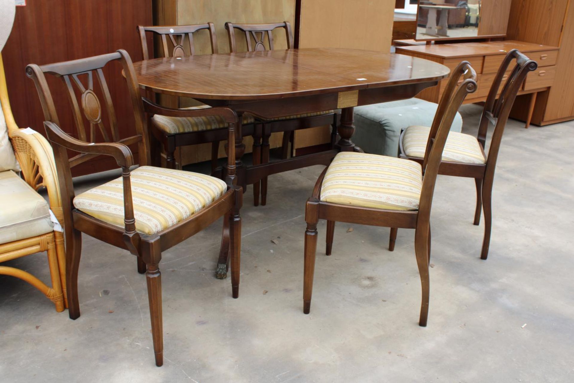 A REGENCY STYLE MAHOGANY AND CROSSBANDED EXTENDING DINING TABLE, 60" X 35" (LEAF 14") ON BRASS - Image 2 of 4