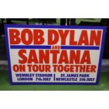 A VINTAGE "BOB DYLAN AND SANTANA" TOUR ADVERT ON BOARD