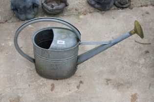 A VINTAGE GALVANISED WATERING CAN