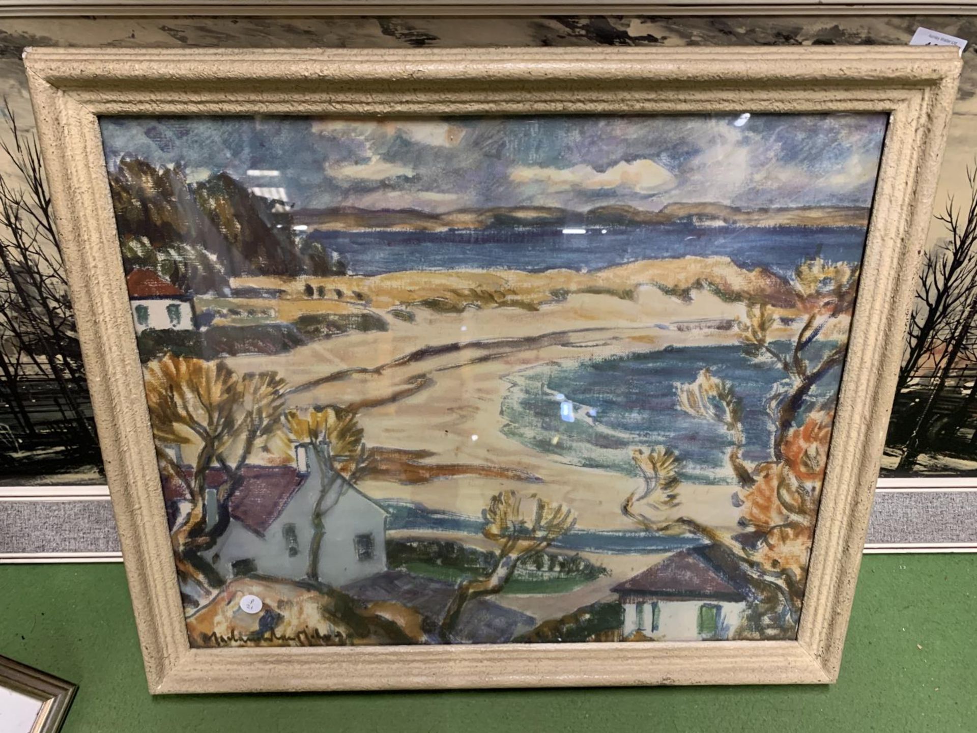 A FRAMED PRINT OF A BEACH SCENE SIGNED