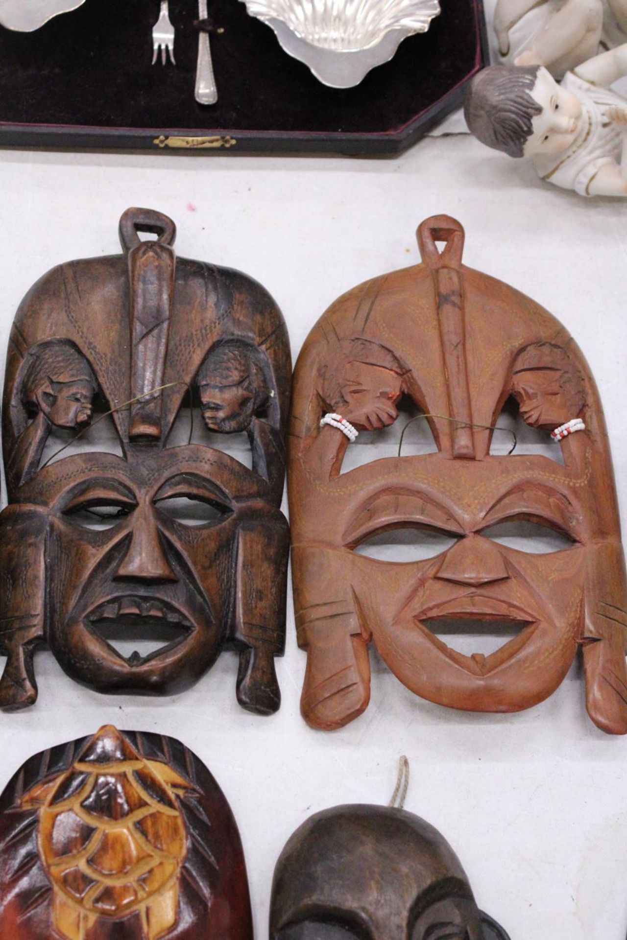 FIVE AFRICAN HAND CARVED WOODEN MASKS - PLUS TWO SPEARS - Image 4 of 5