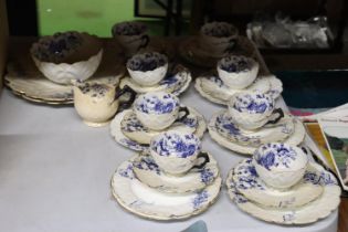 A VINTAGE CHINA TEASET SET, WITH BLUE AND WHITE PATTERN AND FLUTED EDGES, TO INCLUDE CAKE PLATES,