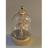 A 9 CARAT GOLD PENDANT WITH A BALLERINA IN A DOME GROSS WEIGHT 13.9 GRAMS
