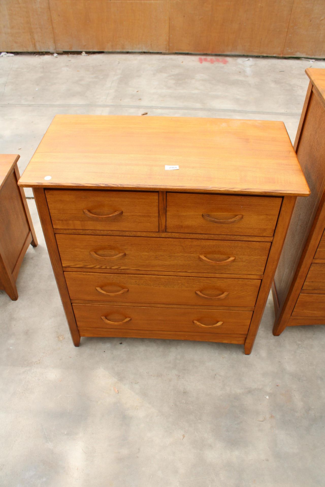 A MODERN OAK CHEST OF TWO SHORT AND THREE LONG DRAWERS, 31" WIDE