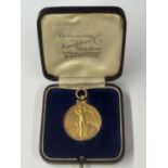 A HALLMARKED 9 CARAT GOLD BIRMINGHAM COUNTY FOOTBALL ASSOCIATION CHARITY CUP JOINT WINNERS MEDAL
