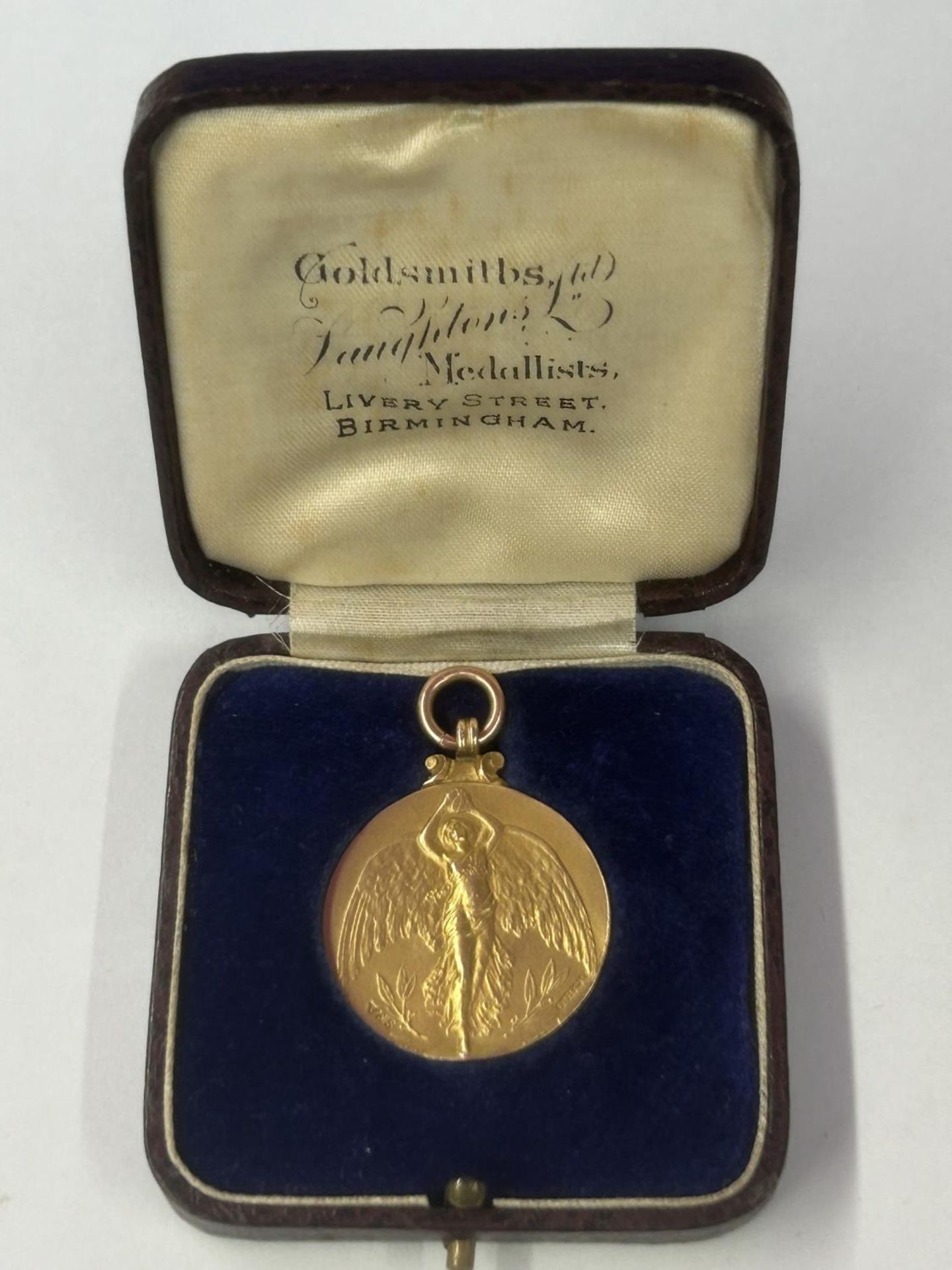 A HALLMARKED 9 CARAT GOLD BIRMINGHAM COUNTY FOOTBALL ASSOCIATION CHARITY CUP JOINT WINNERS MEDAL