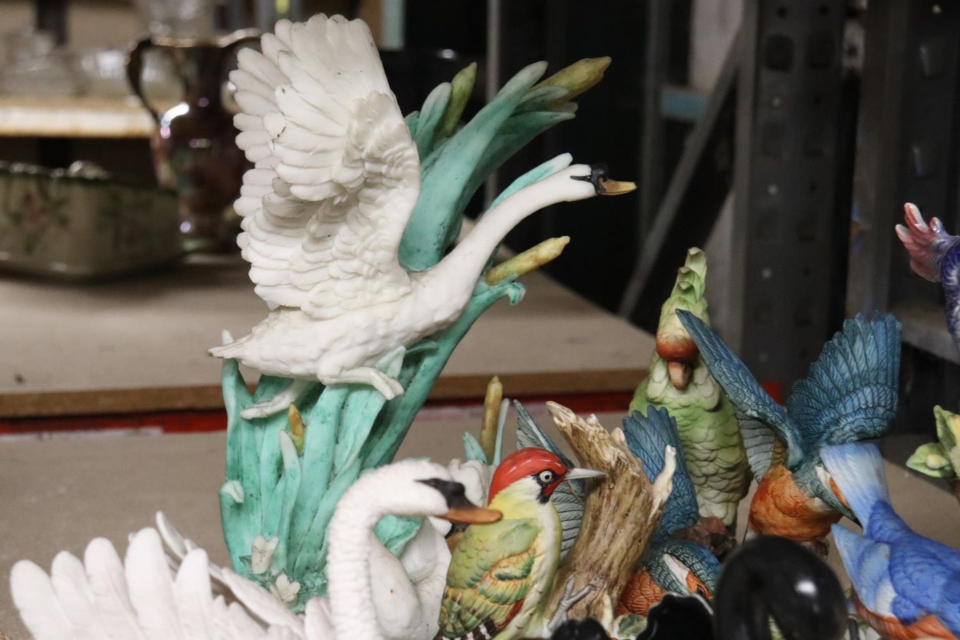 A COLLECTION OF BIRD FIGURINES TO INCLUDE SWANS, A PARROT, WOODPECKER, ETC - Image 5 of 6