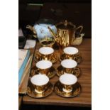 A GILT COLOURED COFFEE POT, SUGAR BOWL, CUPS AND SAUCERS, PLUS A VINTAGE SUDLOW'S TEAPOT AND A