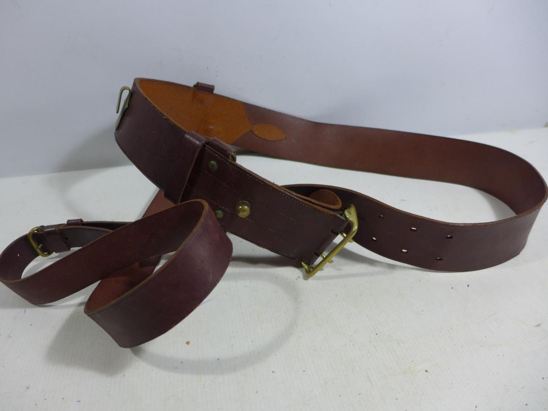 A MILITARY BROWN LEATHER GUN HOLSTER AND LEATHER SAM BROWNE BELT - Image 3 of 3