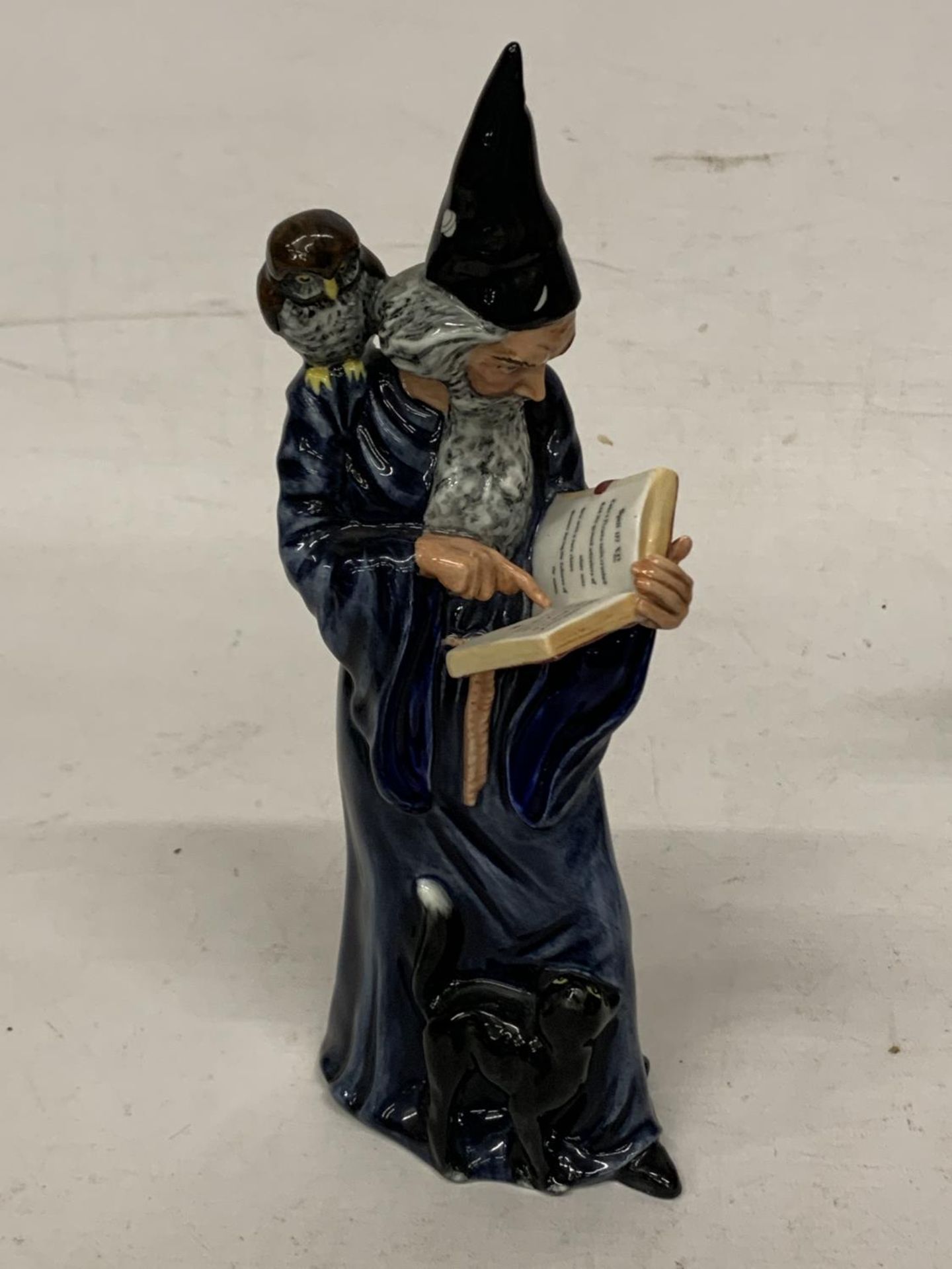 A ROYAL DOULTON FIGURE "THE WIZARD" HN 2877