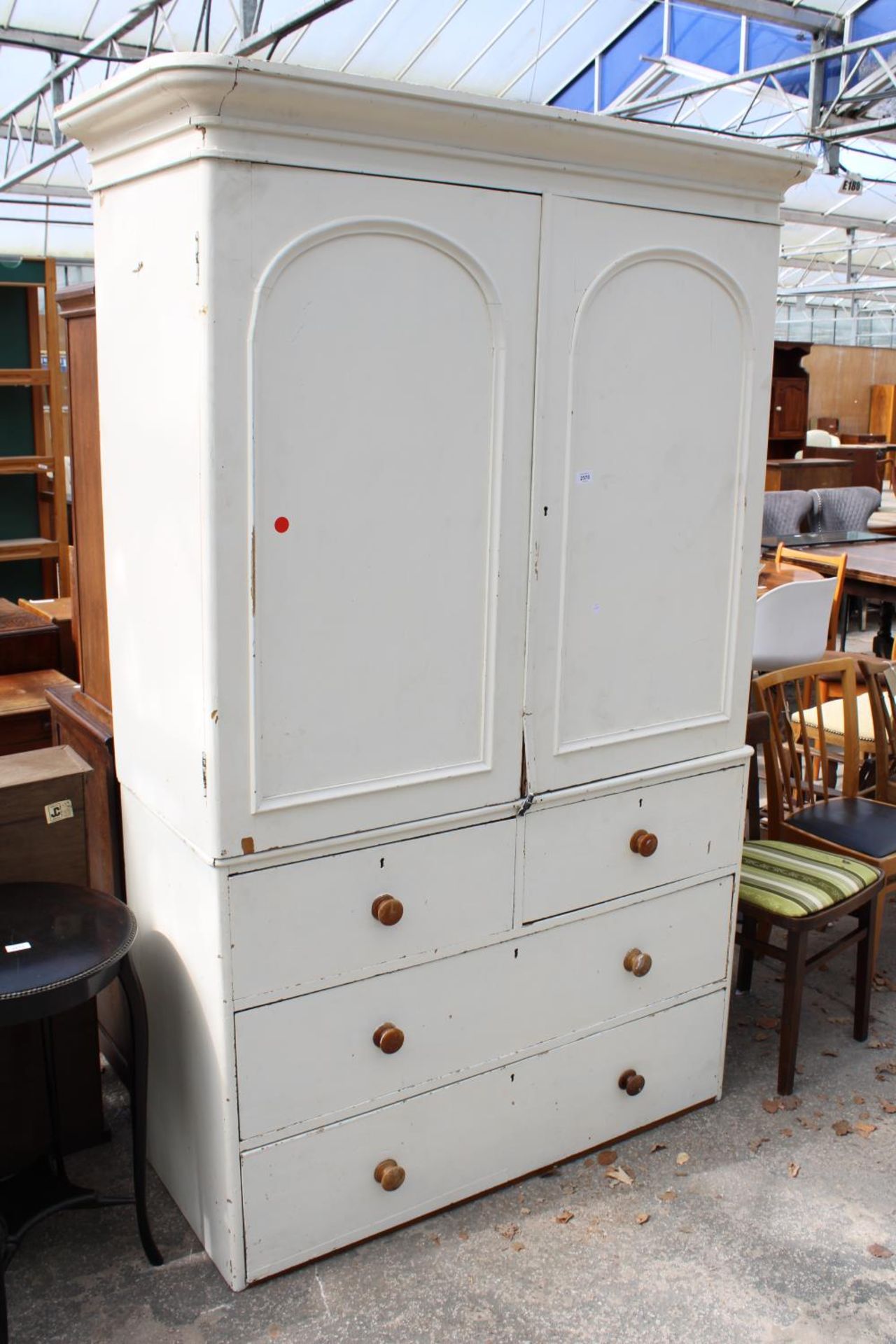 A VICTORIAN HOUSEMAIDS CUPBOARD, WHITE PAINTED OVER SCUMBLE WITH 2 SHORT AND 2 LONG DRAWERS TO BASE,