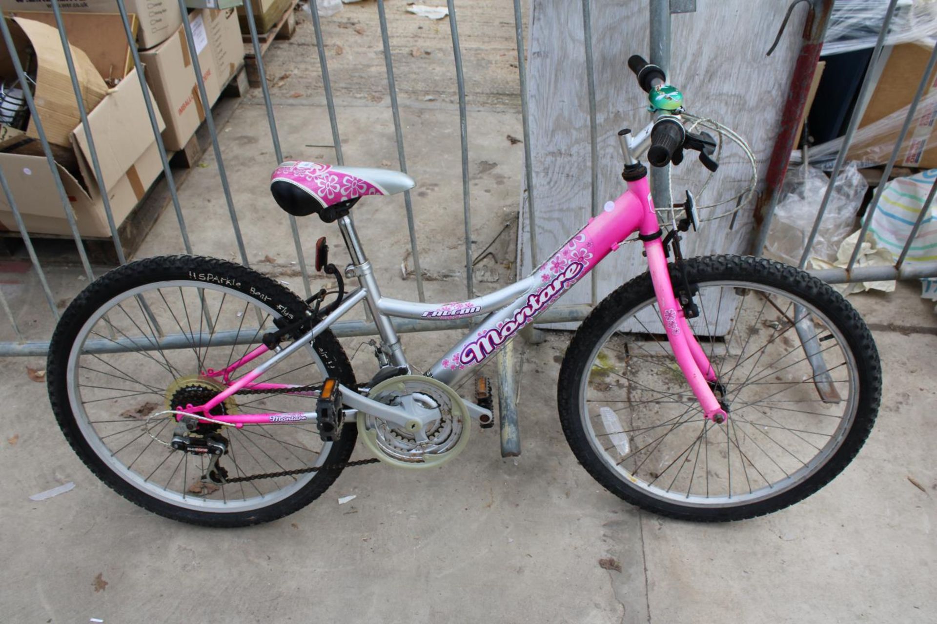 A GIRLS FALCON BIKE WITH 18 SPEED GEAR SYSTEM