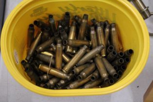 A QUANTITY OF BRASS BULLET CASES