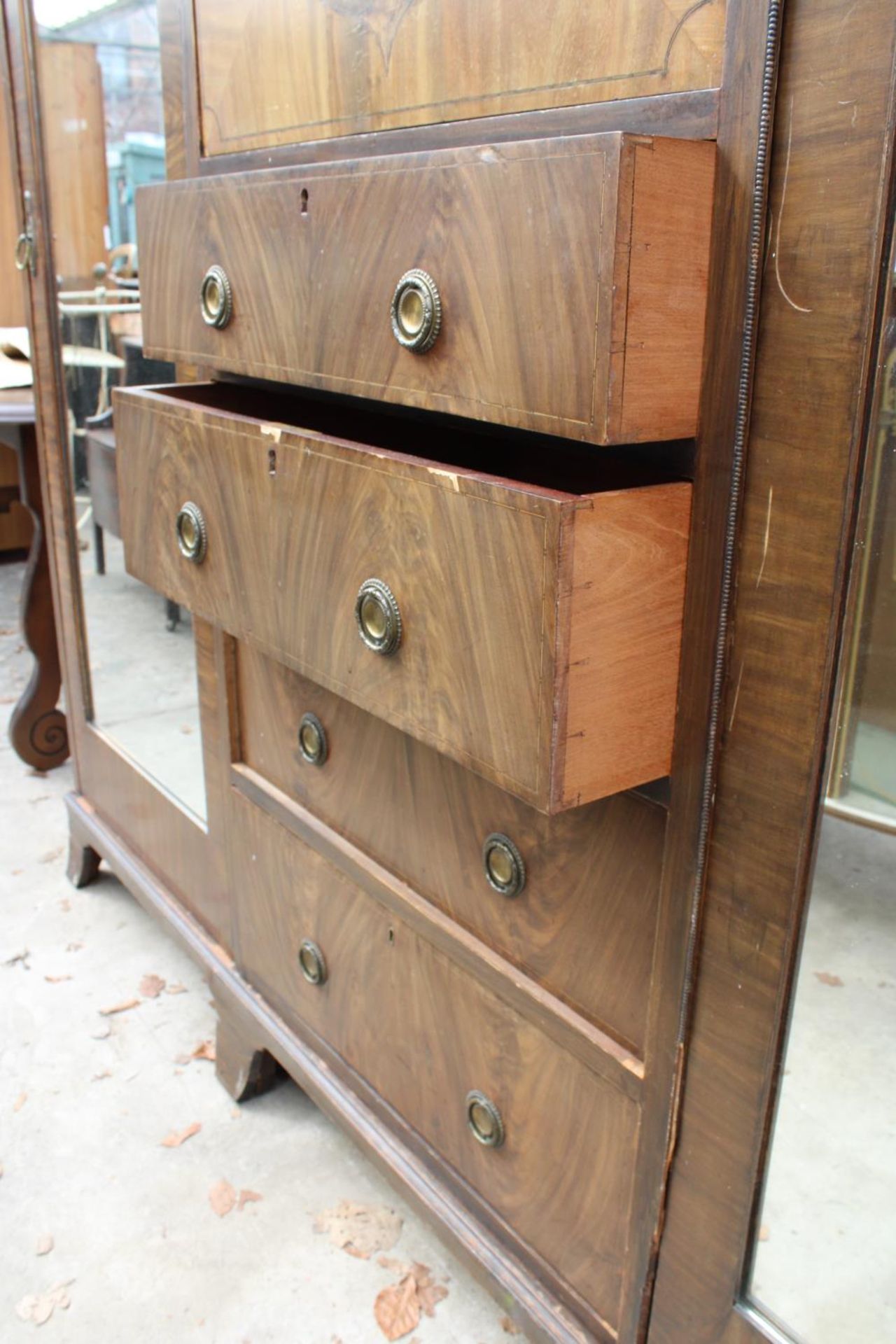 AN EDWARDIAN MAHOGANY DOUBLE MIRROR-DOOR WARDROBE ENCLOSING CUPBOARDS AND FOUR GRADUATED DRAWERS, - Image 2 of 4