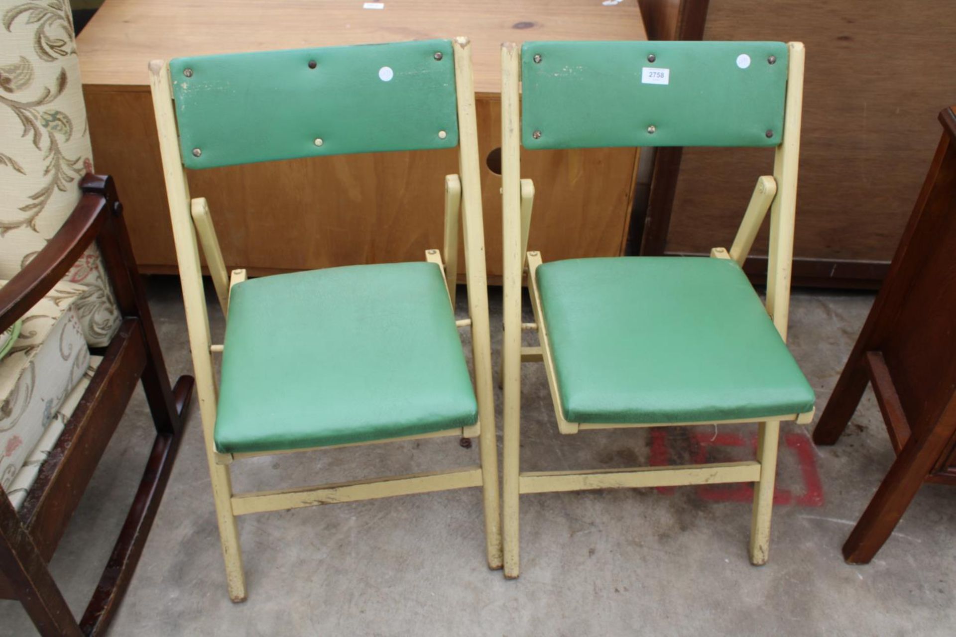 A PAIR OF 1950'S PAINTED FOLDING CHAIRS