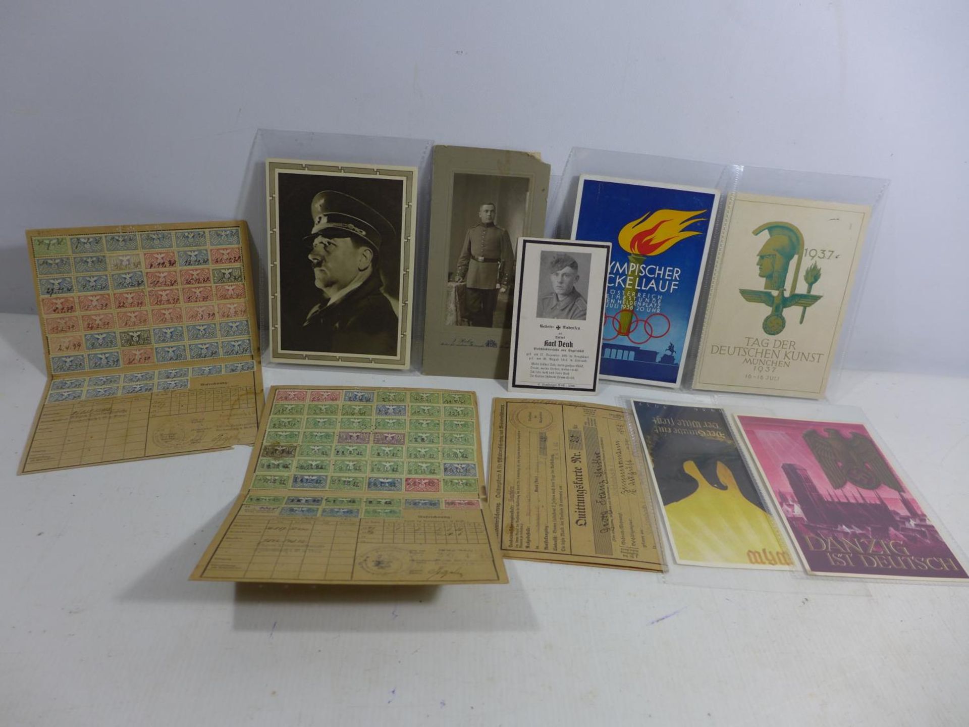 A COLLECTION OF NAZI GERMANY EPHEMERA TO INCLUDE PHOTOGRAPHS, INVALIDENVERS CARDS ETC