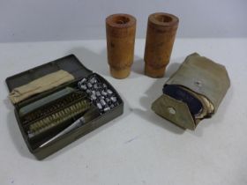 TWO WOODEN MARK I N 1 BREECH SPACERS AND TWO MILITARY GUN CLEANING KITS
