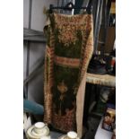 A VINTAGE OLIVE GREEN PATTERNED WALL HANGING, APPROX 60CM X 96CM