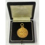 A HALLMARKED 9 CARAT GOLD FOOTBALL LEAGUE DIVISION 3 NORTHERN SECTION LEAGUE WINNERS MEDAL 1953-1954