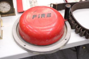 A VINTAGE RED FIRE BELL