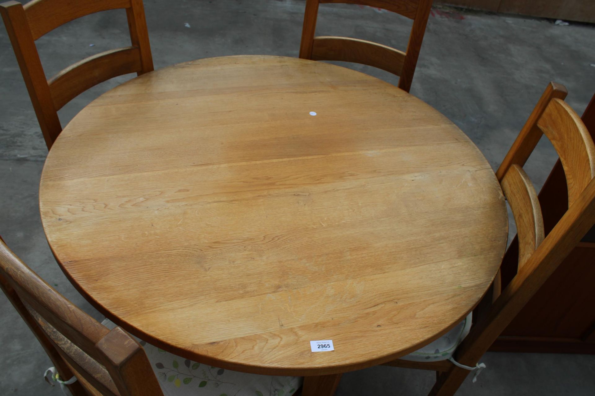 A CIRCULAR OAK DINING TABLE, WITH FOUR OAK LADDER BACK DINING CHAIRS WITH RUSH SEATS, DIAMETER 111CM - Image 3 of 3