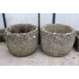 A MATCHING PAIR OF RECONSTITUTED STONE GARDEN PLANTERS