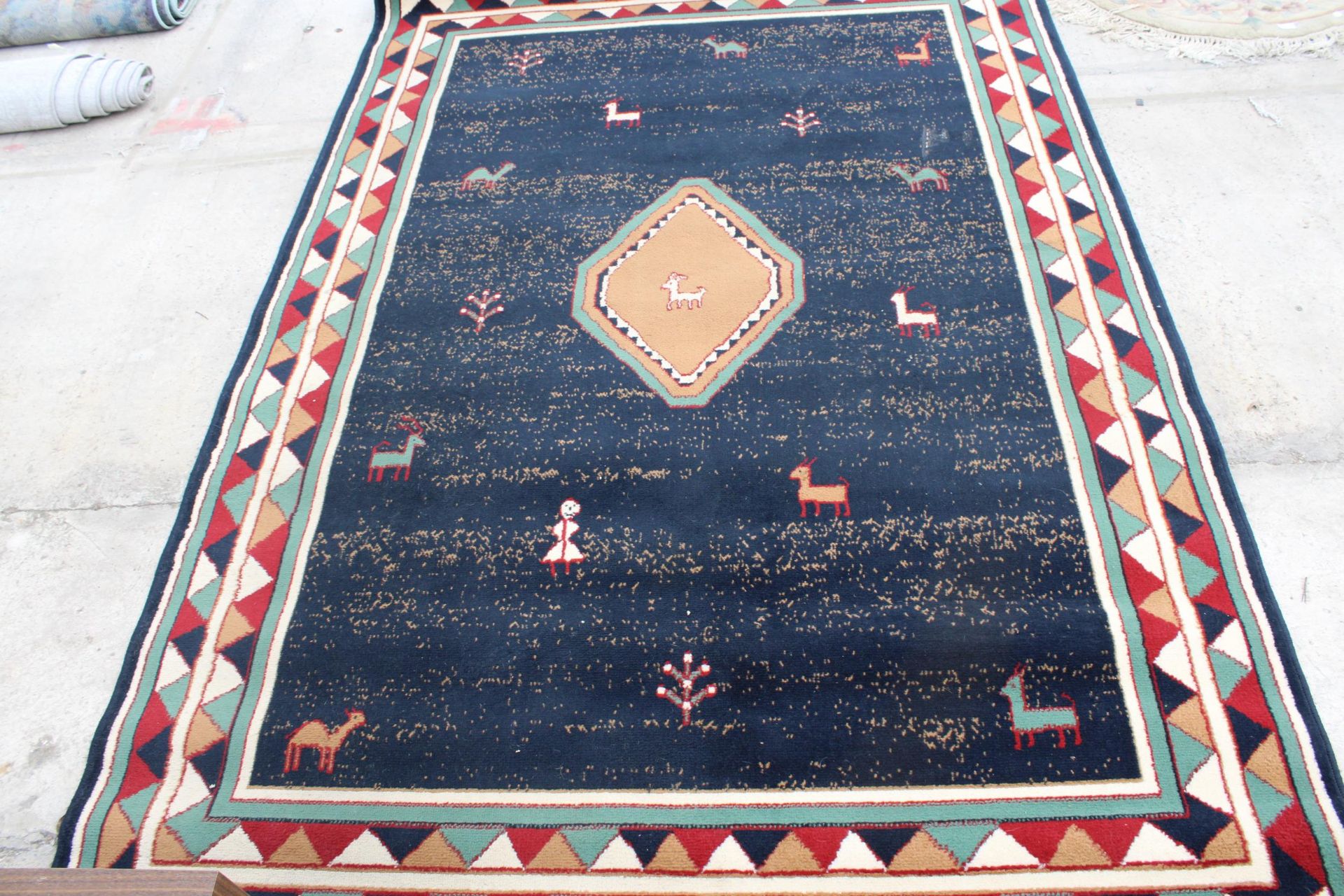 A MULTICOLOURED PATTERNED RUG - Image 2 of 5