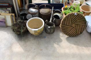 AN ASSORTMENT OF GALVANISED WATERING CANS AND A PLANT POT