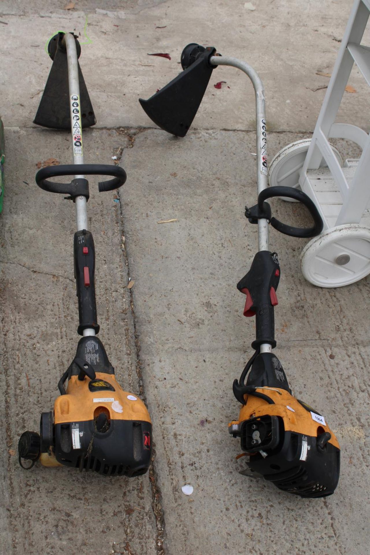 TWO JCB PETROL GRASS STRIMMERS