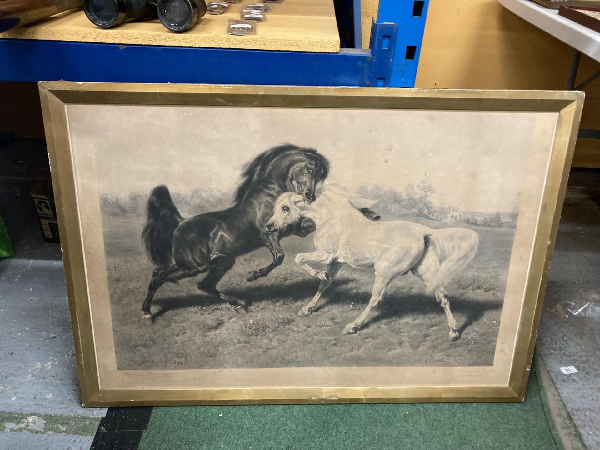 A FRAMED SIGNED PRINT OF A PAINTING BY ROSA BONHEUR OF TWO STALLIONS FIGHTING WITH GALLERY STAMP