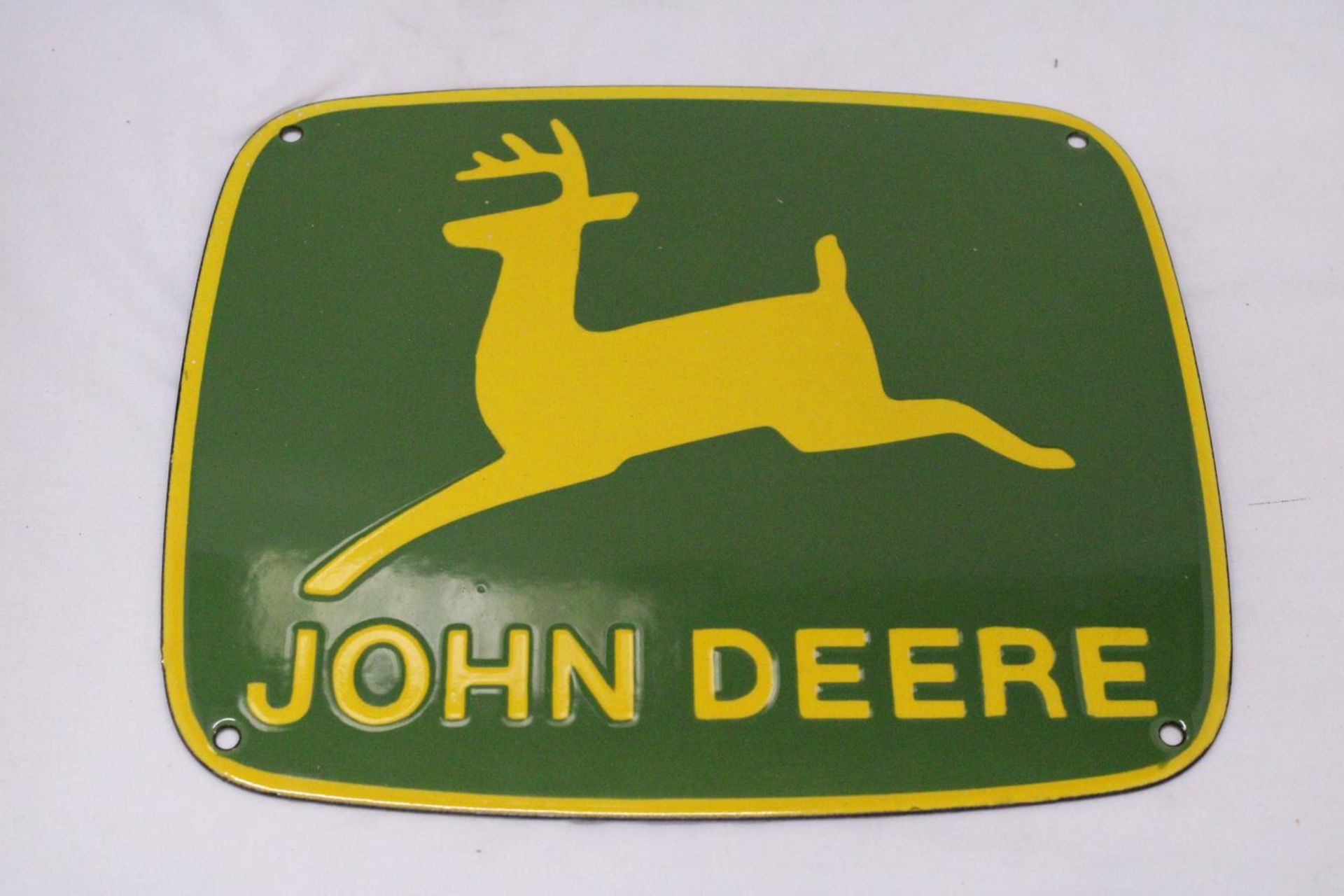 A JOHN DEERE ENAMEL SIGN