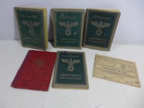 A COLLECTION OF NAZI GERMANY IDENTITY PAPERS TO INCLUDE UKRAINIAN NATIONALS ETC